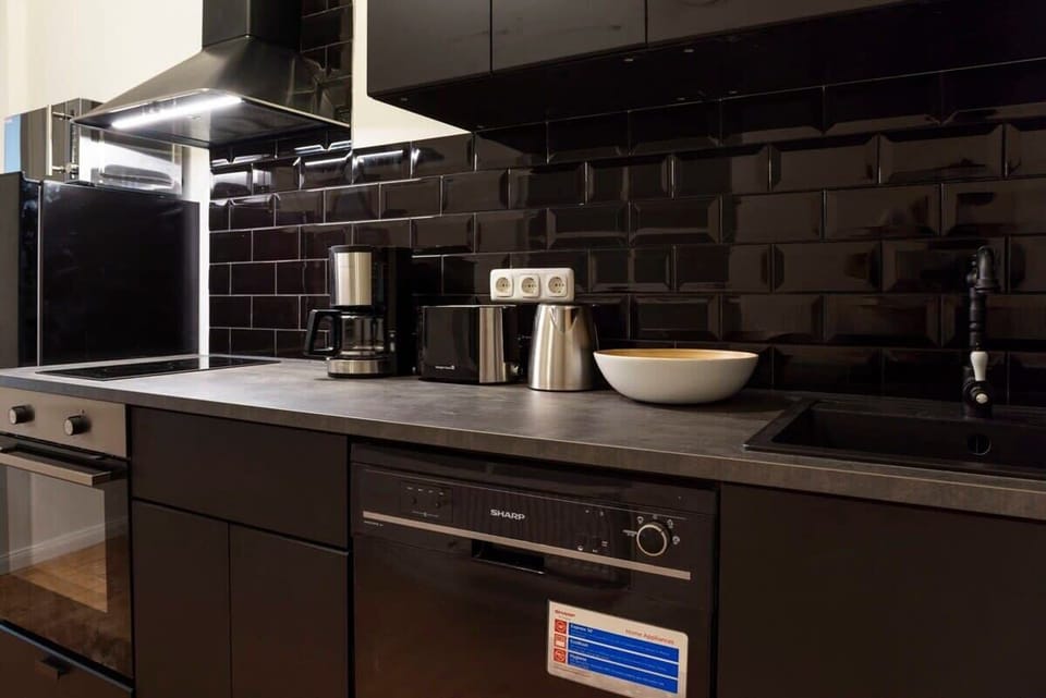 Kitchen with stove and dishwasher