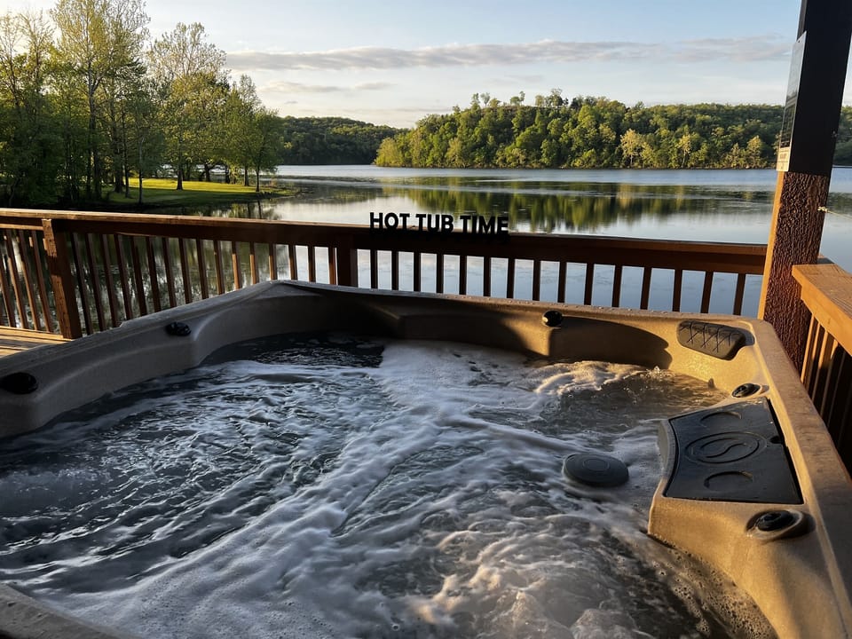 Soak in the private hot tub on the deck over looking the lake. This is the best hot tub spot in all of Branson!