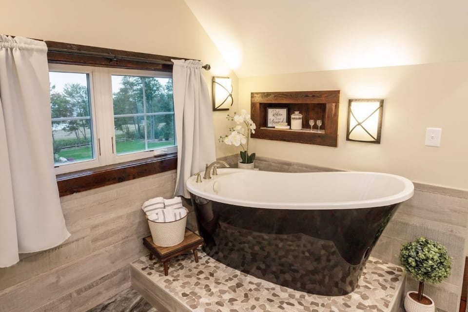 Relax in a spa-style soaking tub with a view