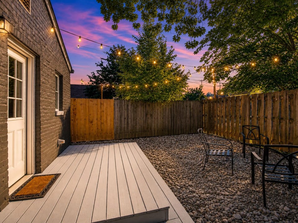 Step out to the private deck and enjoy the peaceful fenced backyard.