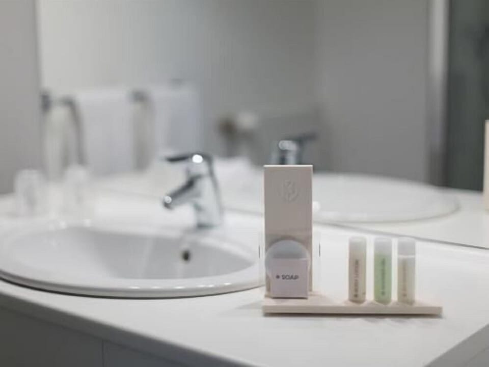 Shower, eco-friendly toiletries, hair dryer, towels