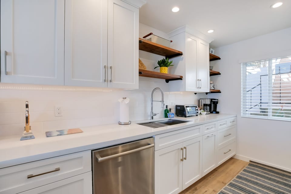 Fully equipped kitchen along with full sized washer/dryer.