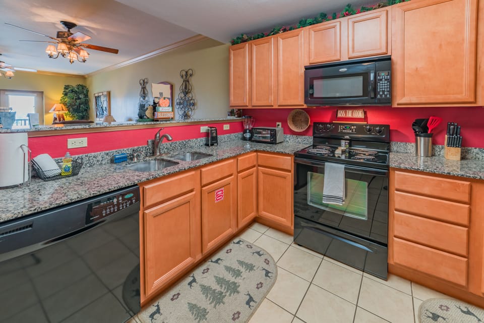 Fully stocked kitchen - dishwasher, fridge, microwave, stove & cooking utensils