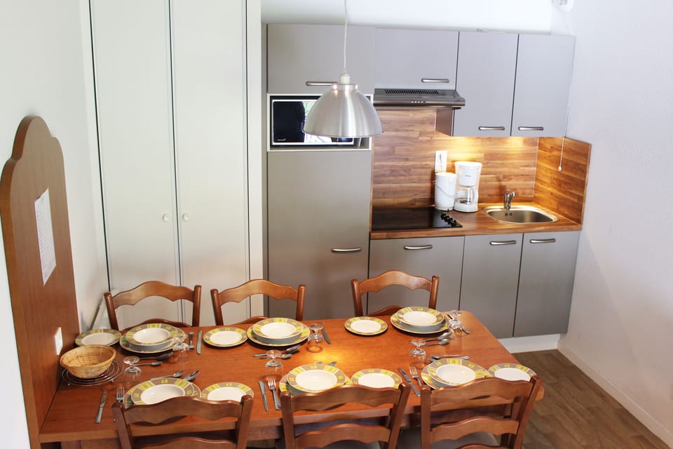 Share meals and laughs at the dining table.