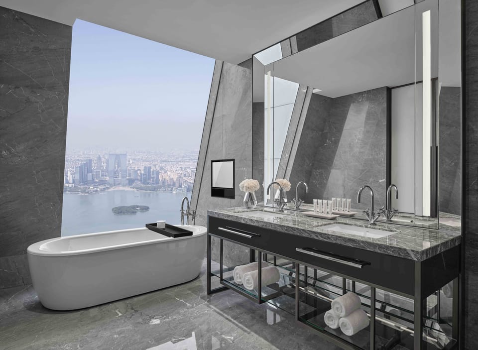 Superior Suite, 1 Queen Bed | Bathroom | Separate tub and shower, rainfall showerhead, designer toiletries