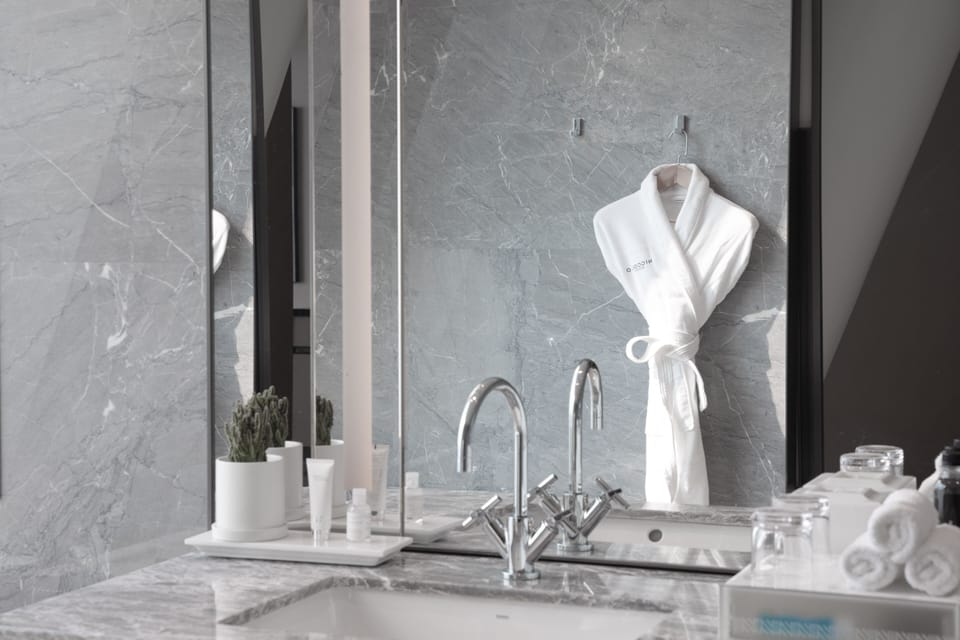 Superior Suite, 1 Queen Bed | Bathroom | Separate tub and shower, rainfall showerhead, designer toiletries