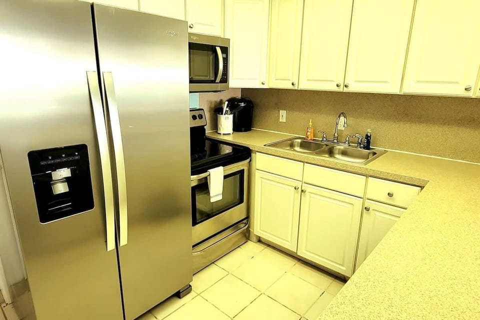 Apartment, 2 Bedrooms | Private kitchen | Fridge, oven, coffee/tea maker, toaster