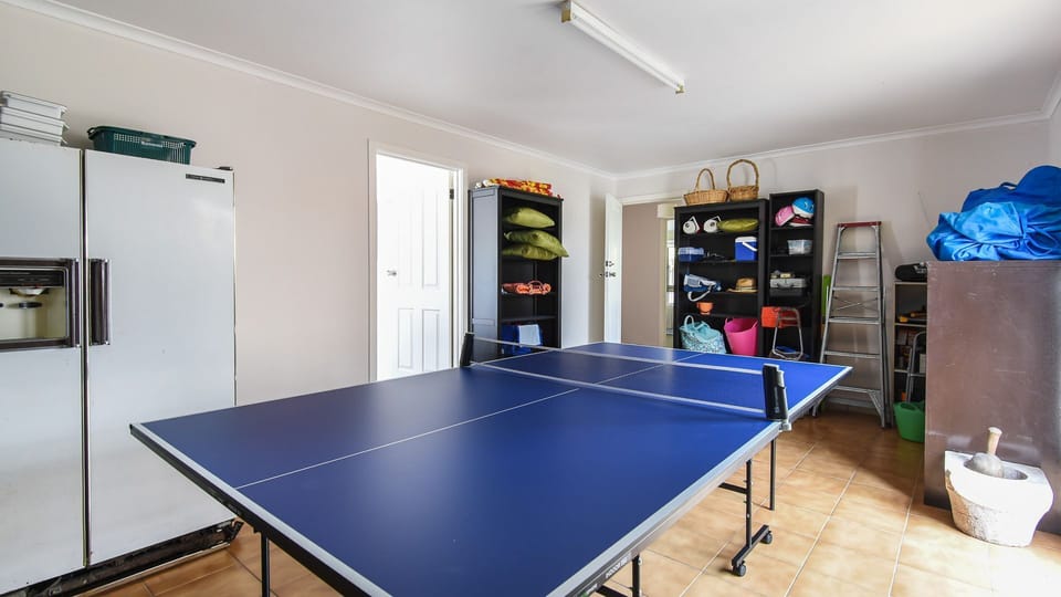 Games room with ping pong table 