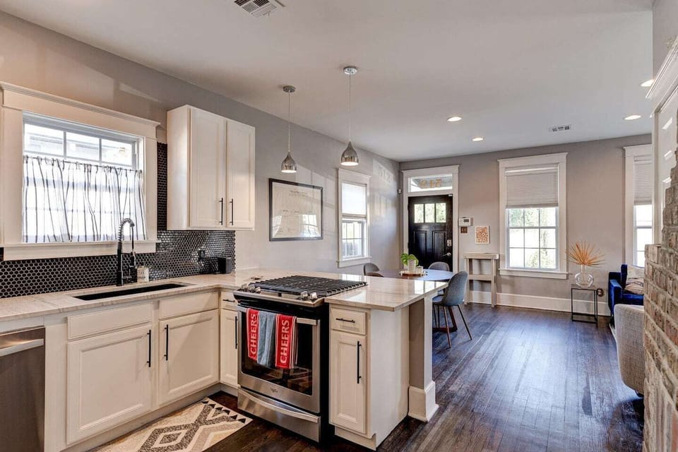 view of the kitchen and the dining room space 