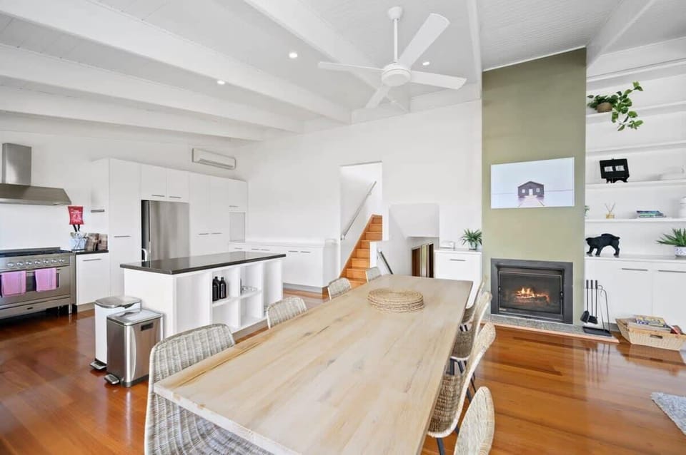 The open plan design ensures everyone can stay connected while cooking and dining