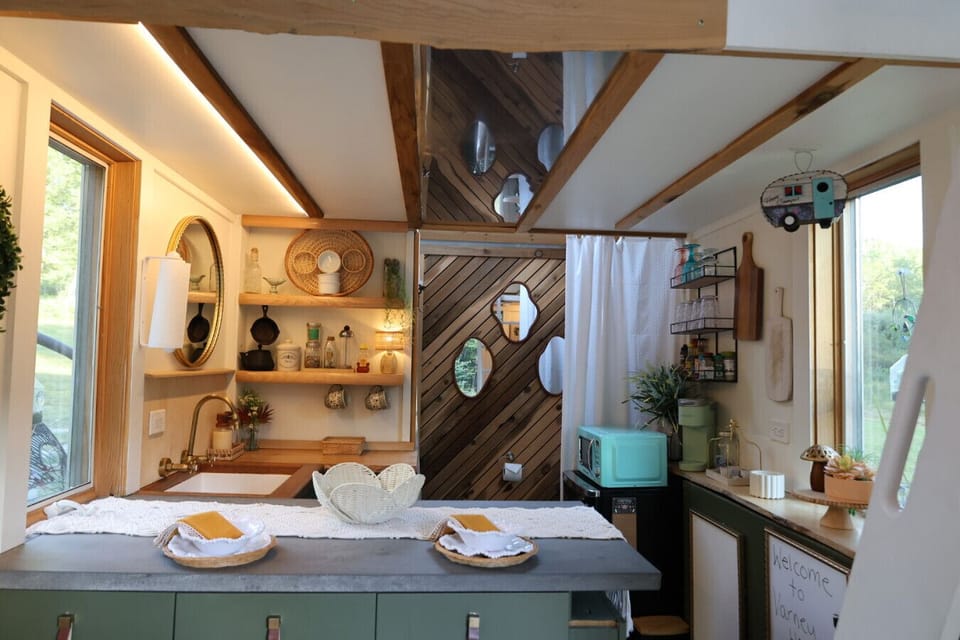 Beautiful natural light fills this tiny home’s open and relaxing interior.
