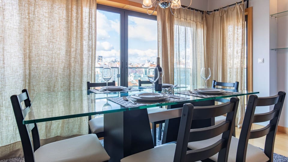 A lovely dining area with a beautiful view for the making of new experiences #airbnb #airbnblisbon #portugal #pt #lisbon