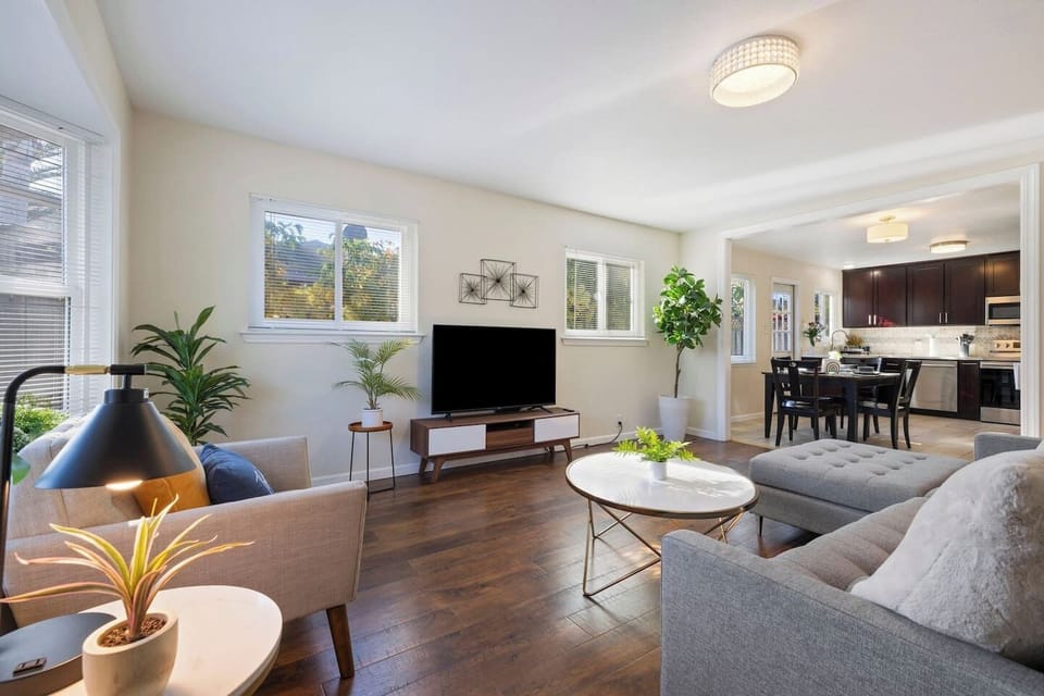 Enjoy watching your favorite shows on our TCL Smart TV on our huge comfy sofa.