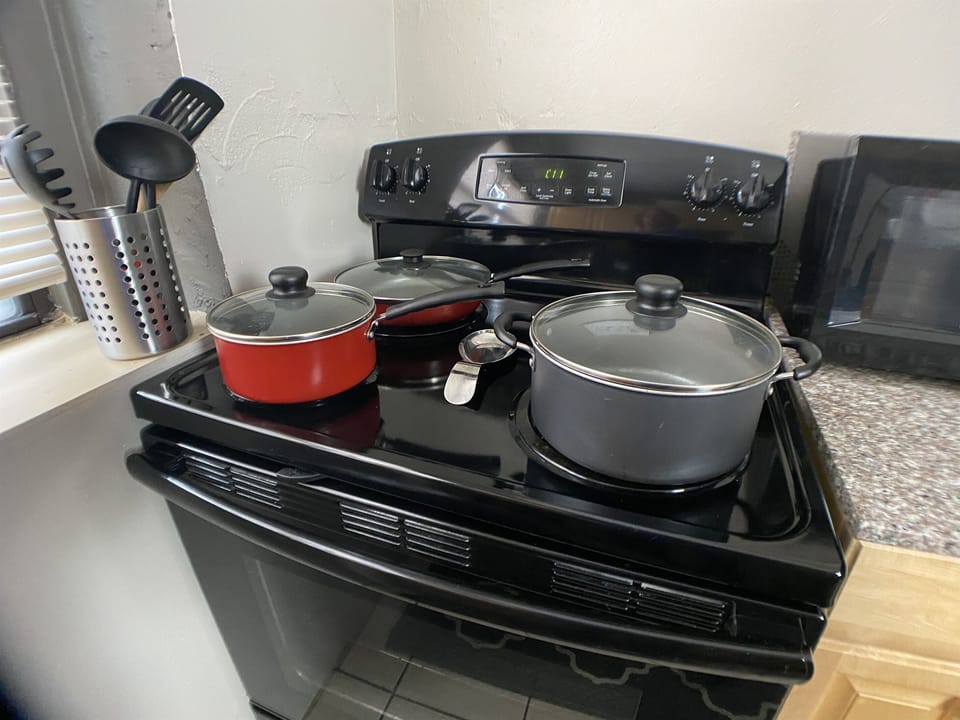 Pots & pans provided for cooking.