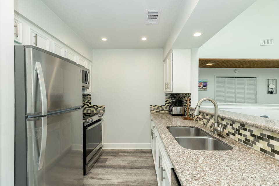 Fully equipped kitchen with stainless steel appliances