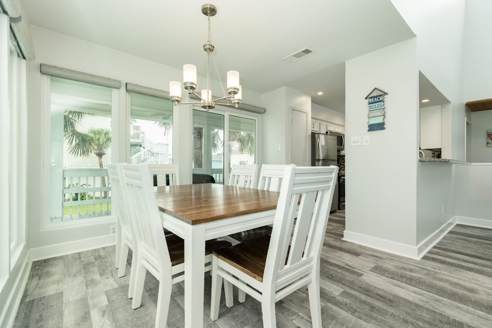 The adjacent kitchen makes serving meals easy