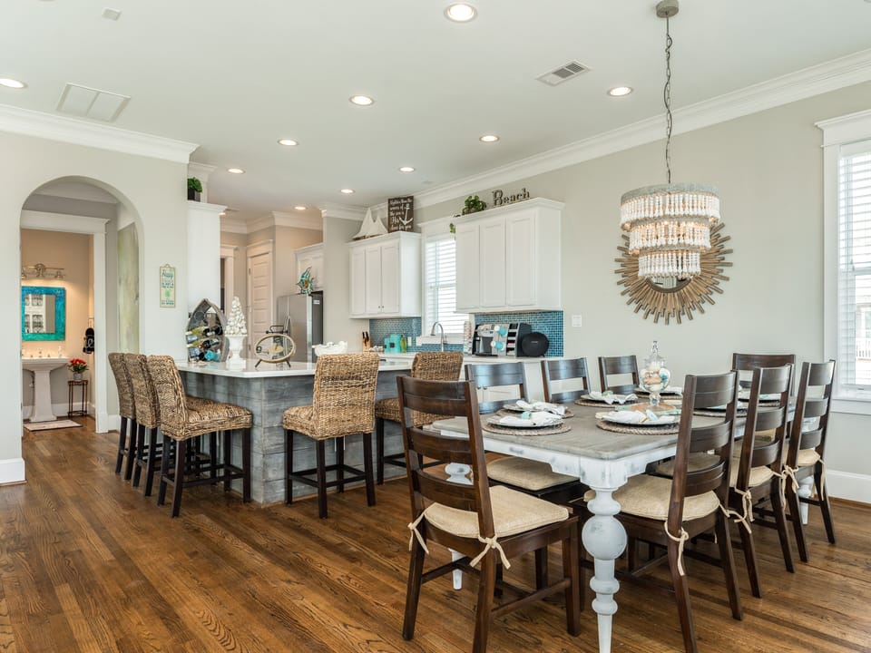 Easily serve homecooked meals in the open kitchen and dining area