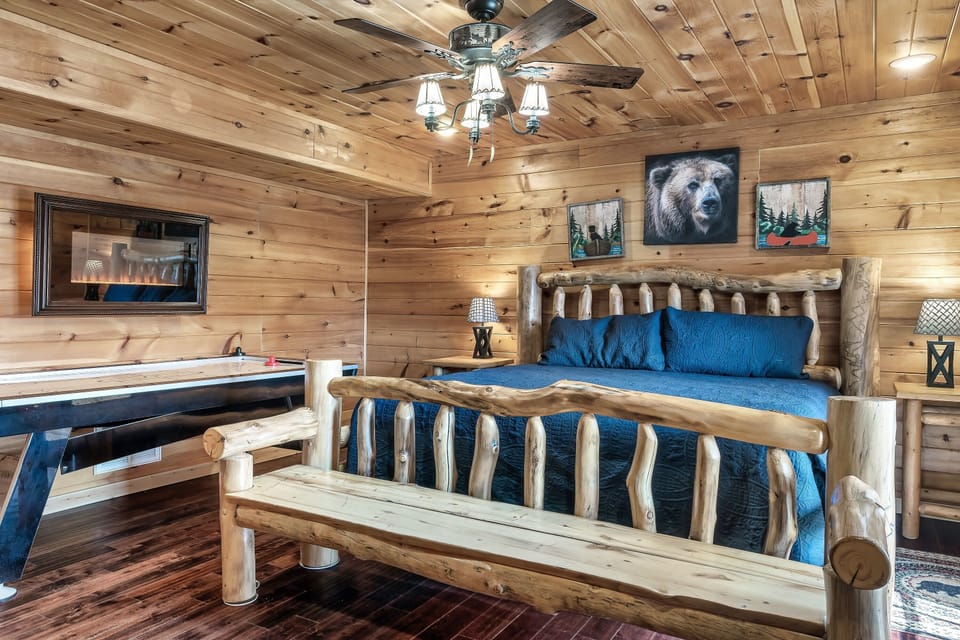 Lower level king-size bed, bathroom, flatscreen TV w/ Roku, air hockey  