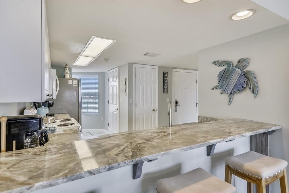 Condo, 2 Bedrooms | Private kitchen | Fridge, coffee/tea maker, toaster