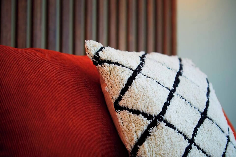 Bed: A cozy haven for rest and rejuvenation, offering comfort and tranquility for a good night's sleep.