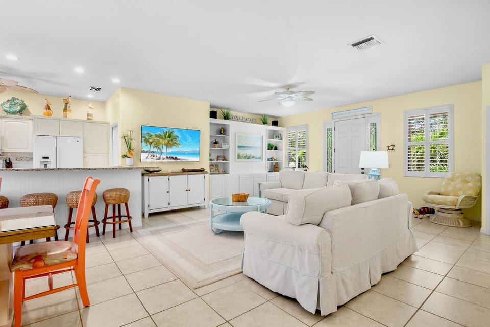 Living area with plush seating and TV