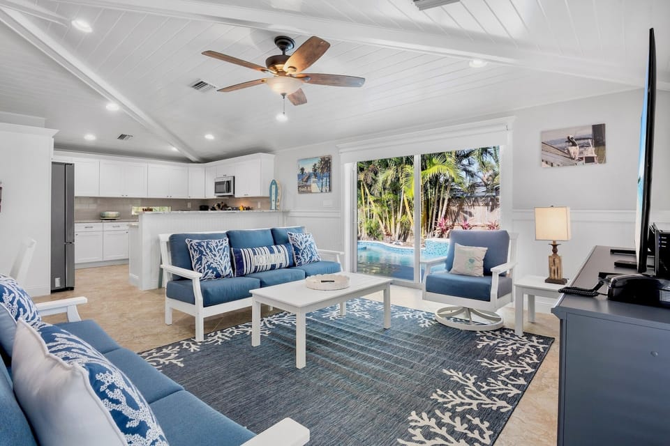 Living room with pool views