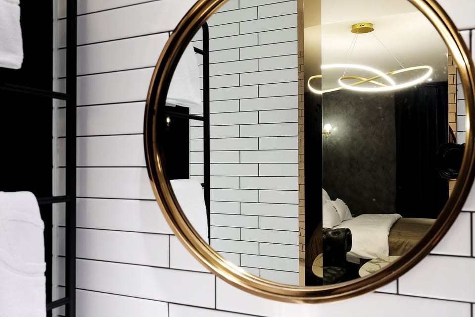 VIP Room | Blackout drapes, soundproofing, iron/ironing board, free WiFi