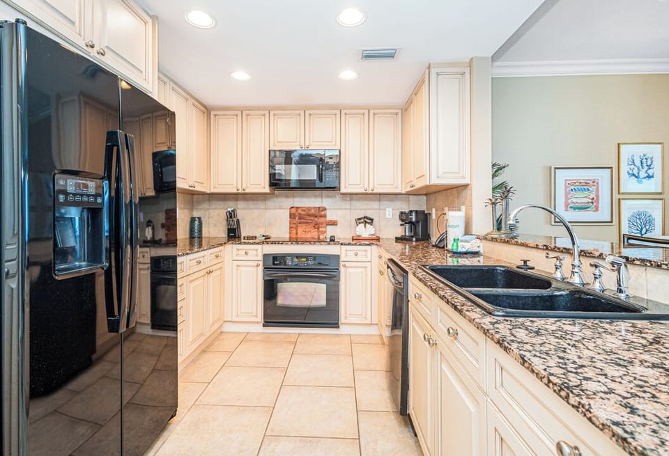 Your gourmet kitchen is fully equipped with modern appliances, granite countertops, and plenty of space to prepare delicious meals together during your stay.
