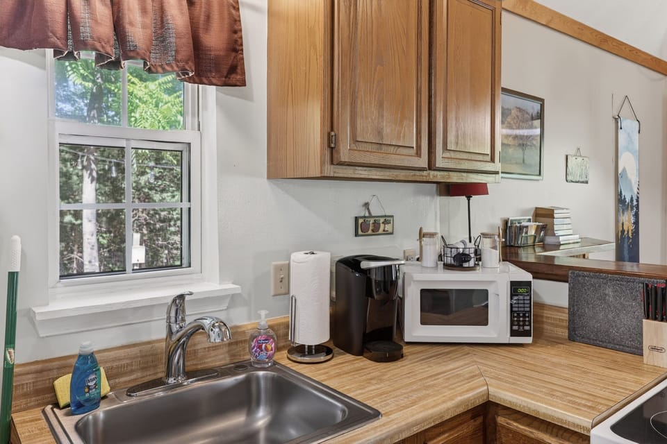 Kitchen essentials plus a coffee station to help start your mornings right.