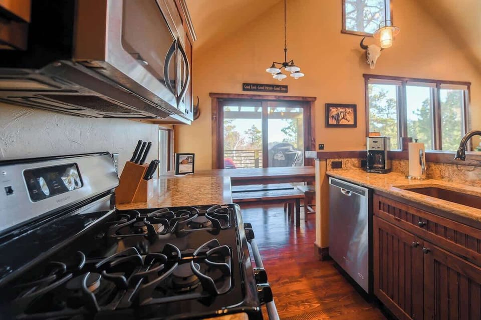 Kitchen view facing the sliding glass doors to the main floor deck