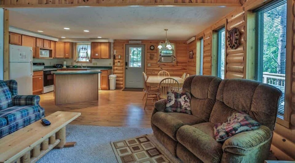 Main level with vaulted ceiling and open floor plan.