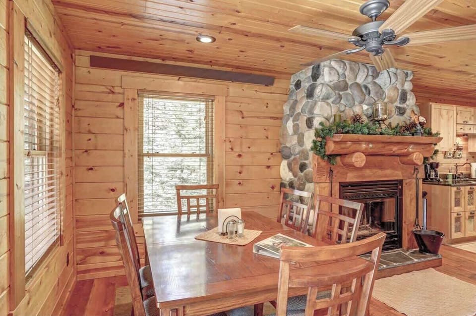 Dining area with seating for 6 and wood burning fireplace 