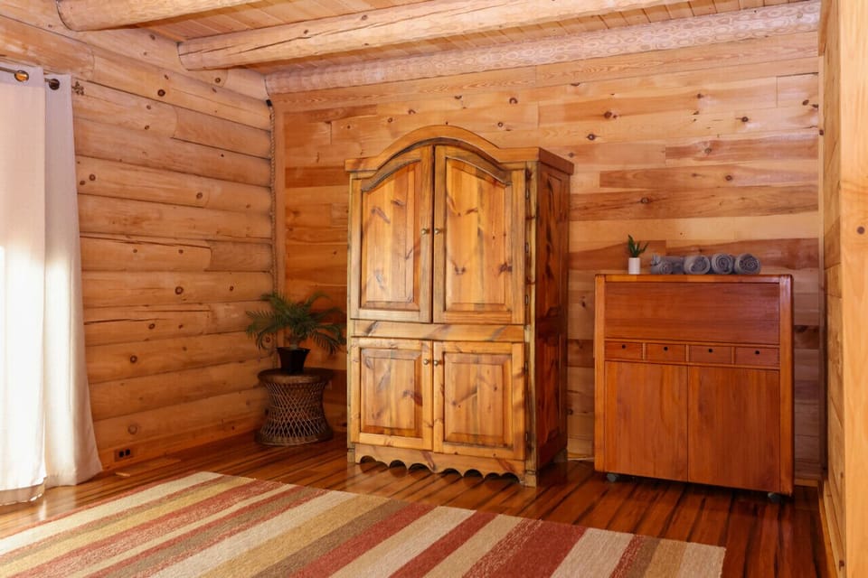 Cozy first-floor king bedroom with a Smart TV and ensuite full bathroom.