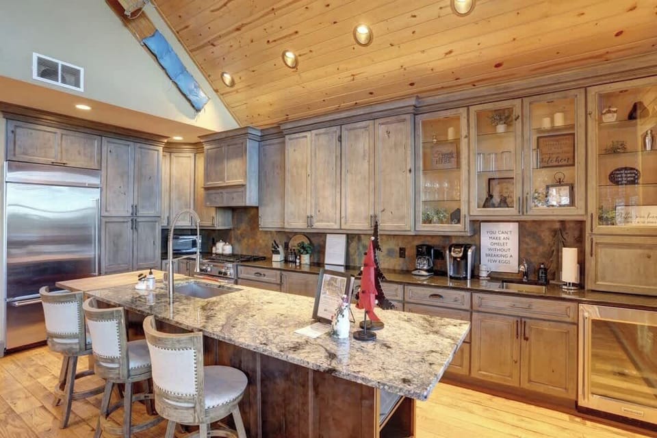 Large fully equipped kitchen with commercial  grade stainless steel appliances