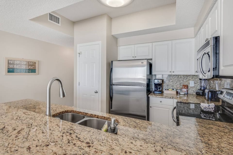 The updated kitchen has granite countertops, stainless steel appliances, and is fully stocked with more than the basics (coffee/tea bar, oils/spices, Tupperware, plenty of pots/pans/cookware) so you and your group can prepare delicious meals while overlook