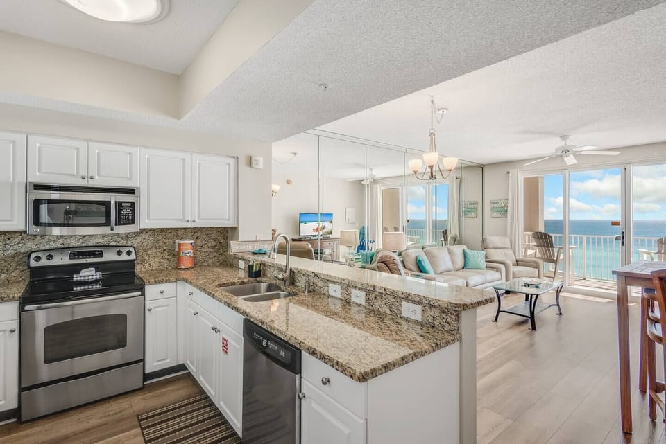 The updated kitchen has granite countertops, stainless steel appliances, and is fully stocked with more than the basics (coffee/tea bar, oils/spices, Tupperware, plenty of pots/pans/cookware) so you and your group can prepare delicious meals while overlook