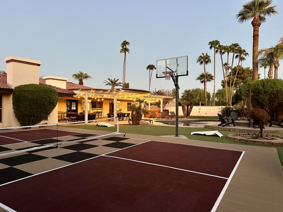 Enjoy our spacious outdoor area with a basketball court—perfect for fun and relaxation during your stay!