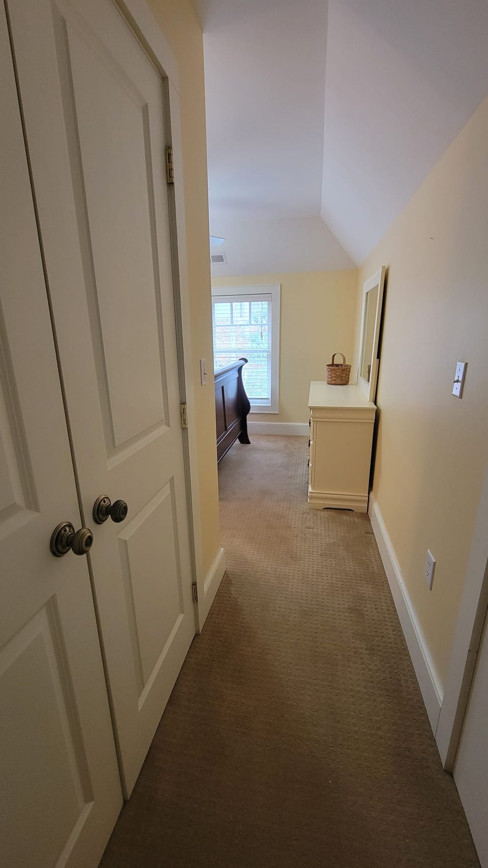 Hallway with large closet in upstairs bedroom w/ensuite offers extra privacy 