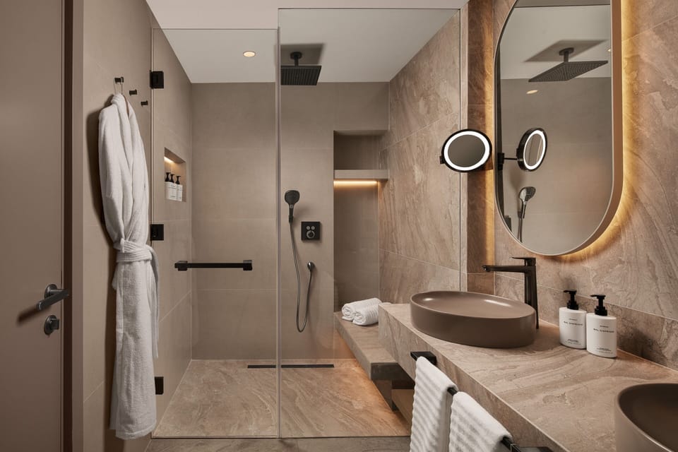 Shower, rainfall showerhead, eco-friendly toiletries, hair dryer