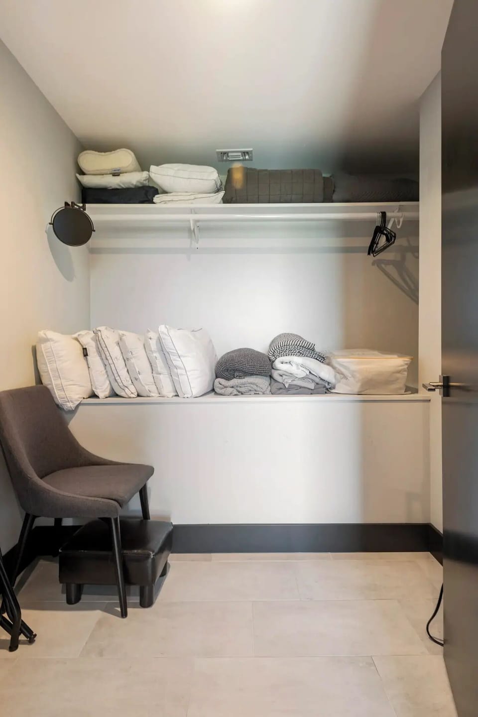 Walk-in closet in bedroom with lots of extras & hanging clothes space