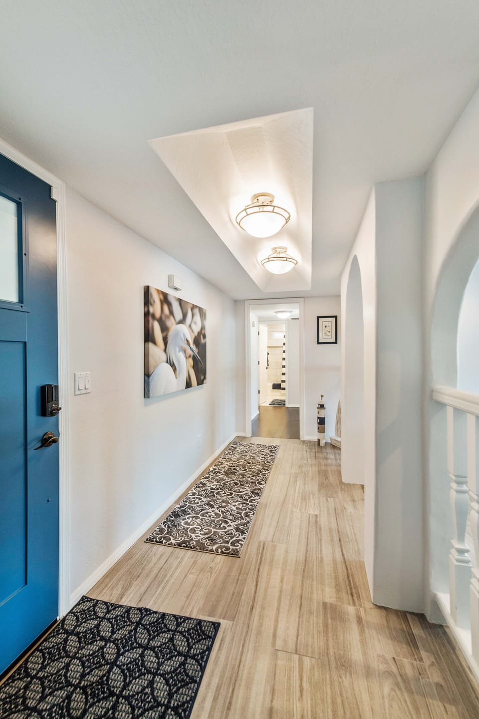 Bright hallway offering a warm welcome to the bedrooms