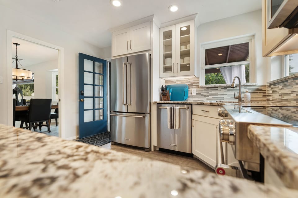 Kitchen with easy access to dining area and outdoor space.