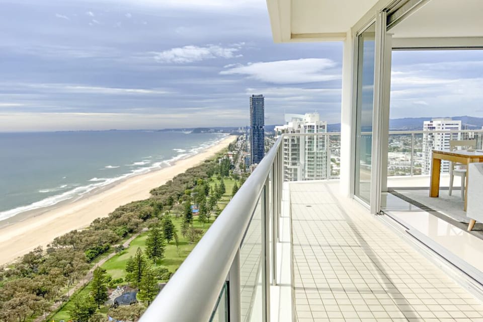 Wrap around balcony with coastal beachfront views