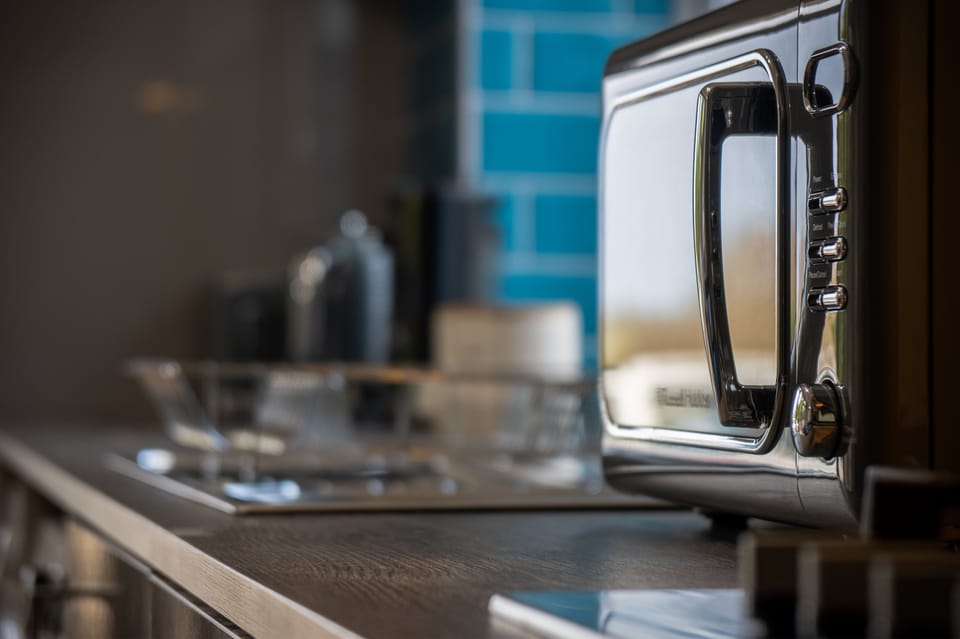 Apartment (1 Bedroom) | Private kitchen | Fridge, microwave, oven, stovetop