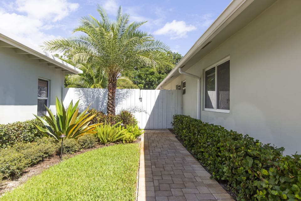 Pathway to fenced in pool area