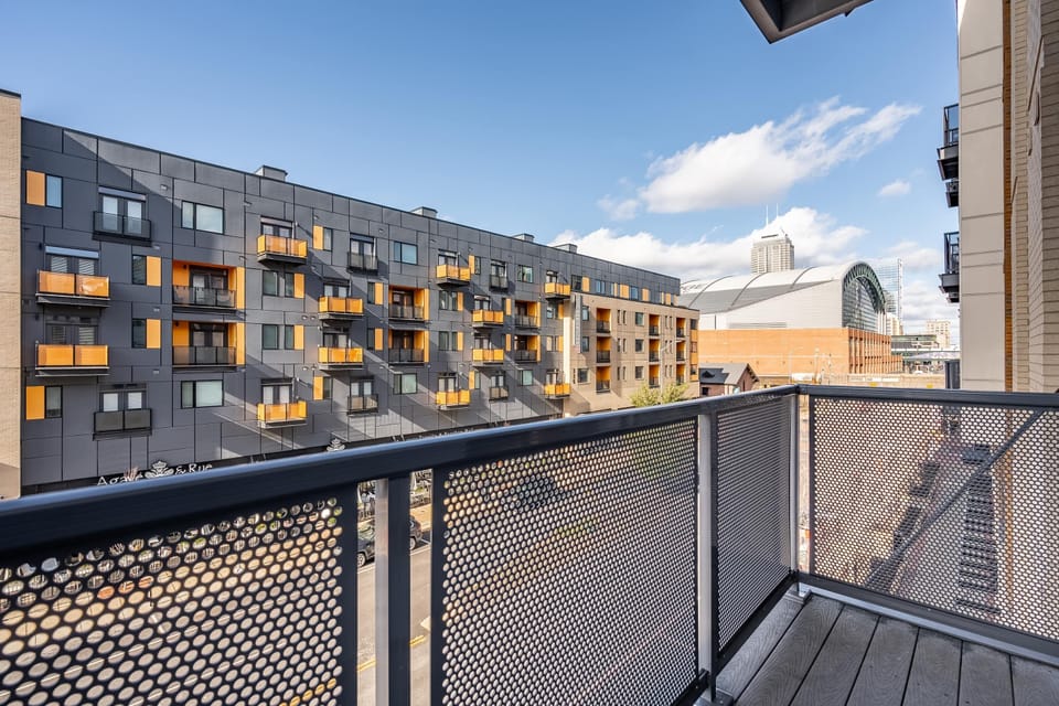 Balcony area, with a view of Gainbridge Fieldhouse and Delaware Street. 