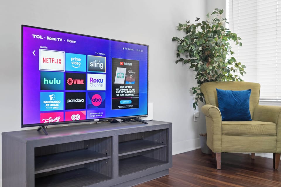 Roku TVs in each room, ready for your own streaming services. 