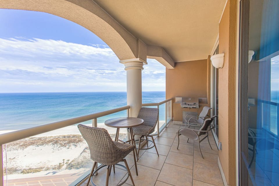 Imagine sipping your morning coffee here, gazing at endless turquoise waters. Your private balcony overlooks pristine white sand and the sparkling gulf, framing every sunrise and sunset in pure coastal magic.