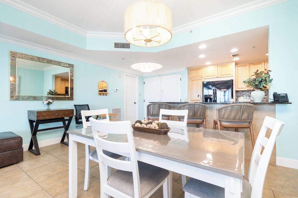 Gather around your elegant dining table where coastal charm meets modern comfort, perfect for memorable meals together.