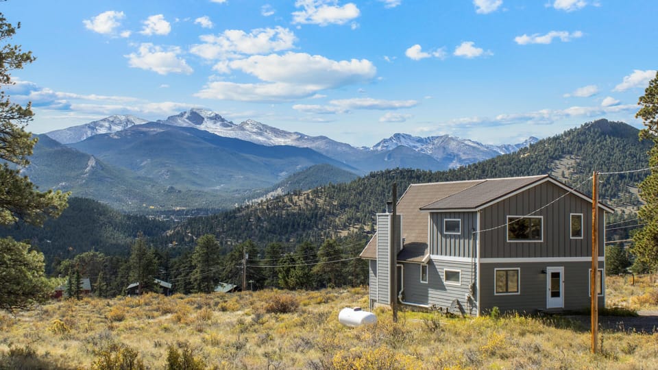 Mountain retreat with panoramic valley views